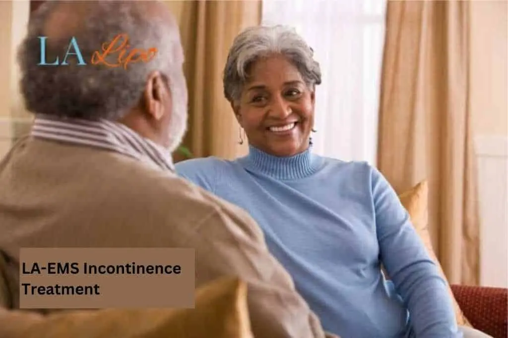 Couple sat smiling at each other - LA-EMS treatment Willesden Green