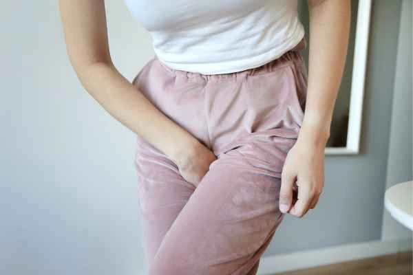 woman struggling with urine incontinence Willesden Green