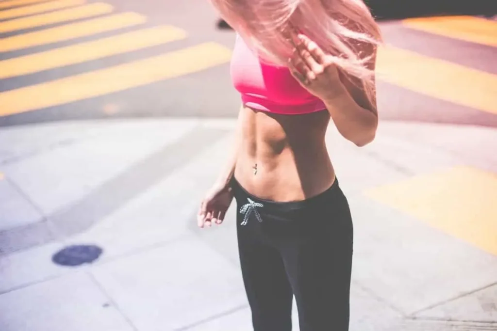 Woman with toned stomach after LA-EMS Body Sculpting Treatment Willesden Green